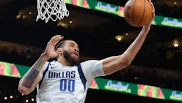 ATLANTA, GEORGIA - APRIL 02: JaVale McGee #00 of the Dallas Mavericks against the Atlanta Hawks during the third quarter at State Farm Arena on April 02, 2023 in Atlanta, Georgia. NOTE TO USER: User expressly acknowledges and agrees that, by downloading and or using this photograph, User is consenting to the terms and conditions of the Getty Images License Agreement. (Photo by Kevin C. Cox/Getty Images)