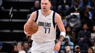Luka Doncic #77 of the Dallas Mavericks during the game against the Memphis Grizzlies at FedExForum on December 08, 2021 in Memphis, Tennessee. NOTE TO USER: User expressly acknowledges and agrees that , by downloading and or using this photograph, User is consenting to the terms and conditions of the Getty Images License Agreement. (Photo by Justin Ford/Getty Images)
