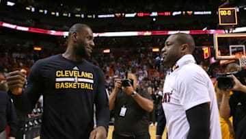 The Miami Heat's Dwyane Wade, right, greets the Cleveland Cavaliers' LeBron James after the Heat's 122-101 win at the AmericanAirlines Arena in Miami on Saturday, March 19, 2016. (David Santiago/El Nuevo Herald/TNS via Getty Images)
