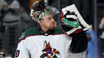 LOS ANGELES, CALIFORNIA - NOVEMBER 21: Karel Vejmelka #70 of the Arizona Coyotes takes a drink during a 2-1 win over the Los Angeles Kings at Staples Center on November 21, 2021 in Los Angeles, California. (Photo by Harry How/Getty Images)