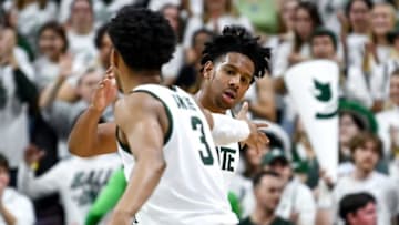 Michigan State's A.J. Hoggard, right, celebrates with Jaden Akins during the first half in the game against Villanova on Friday, Nov. 18, 2022, at the Breslin Center in East Lansing.221118 Msu Villianova 083a
