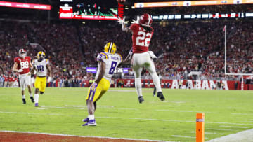 TUSCALOOSA, ALABAMA - NOVEMBER 09: Najee Harris #22 of the Alabama Crimson Tide catches a 15-yard touchdown pass as he is defended by Patrick Queen #8 of the LSU Tigers during the third quarter in the game at Bryant-Denny Stadium on November 09, 2019 in Tuscaloosa, Alabama. (Photo by Kevin C. Cox/Getty Images)