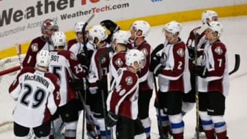 Jan 6, 2015; Chicago, IL, USA; Colorado Avalanche players celebrate a win against the Chicago Blackhawks at the end of an NHL game at United Center. The Avalanche won 2-0. Mandatory Credit: Kamil Krzaczynski-USA TODAY Sports
