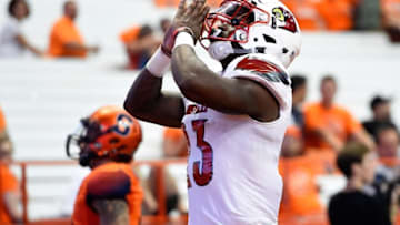 Sep 9, 2016; Syracuse, NY, USA; Louisville Cardinals running back Brandon Radcliff (23) celebrates his touchdown run against the Syracuse Orange during the fourth quarter at the Carrier Dome. Louisville defeated Syracuse 62-28. Mandatory Credit: Rich Barnes-USA TODAY Sports