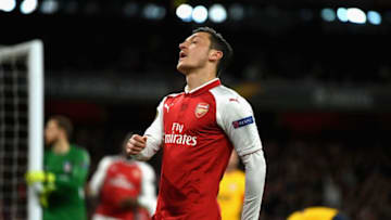 LONDON, ENGLAND - APRIL 26: Mesut Ozil of Arsenal looks dejected during the UEFA Europa League Semi Final leg one match between Arsenal FC and Atletico Madrid at Emirates Stadium on April 26, 2018 in London, United Kingdom. (Photo by Mike Hewitt/Getty Images)