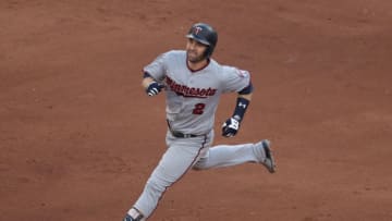 TORONTO, ON - JULY 25: Brian Dozier #2 of the Minnesota Twins runs to second base as he hits a double in the eleventh inning during MLB game action against the Toronto Blue Jays at Rogers Centre on July 25, 2018 in Toronto, Canada. (Photo by Tom Szczerbowski/Getty Images)