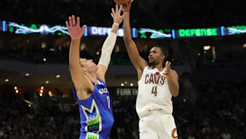 MILWAUKEE, WISCONSIN - NOVEMBER 16: Evan Mobley #4 of the Cleveland Cavaliers shoots over Brook Lopez #11 of the Milwaukee Bucks during the second half of a game at Fiserv Forum on November 16, 2022 in Milwaukee, Wisconsin. NOTE TO USER: User expressly acknowledges and agrees that, by downloading and or using this photograph, User is consenting to the terms and conditions of the Getty Images License Agreement. (Photo by Stacy Revere/Getty Images)