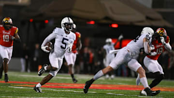 Nov 6, 2021; College Park, Maryland, USA; Penn State Nittany Lions wide receiver Jahan Dotson (5) runs a fourth quarter touchdown tight end Theo Johnson (84) blocks Maryland Terrapins defensive back Jordan Mosley (18) defends at Capital One Field at Maryland Stadium. Mandatory Credit: Tommy Gilligan-USA TODAY Sports