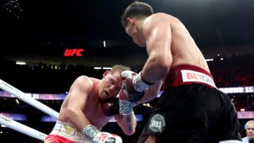 LAS VEGAS, NEVADA - MAY 07: Dmitry Bivol (R) throws a right at Canelo Alvarez during their WBA light heavyweight title fight at T-Mobile Arena on May 07, 2022 in Las Vegas, Nevada. Bivol retained his title by unanimous decision. (Photo by Al Bello/Getty Images)