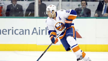 Mar 19, 2016; Dallas, TX, USA; New York Islanders right wing Kyle Okposo (21) skates with the puck against the Dallas Stars in the third period at American Airlines Center. Dallas won 3-0. Mandatory Credit: Tim Heitman-USA TODAY Sports