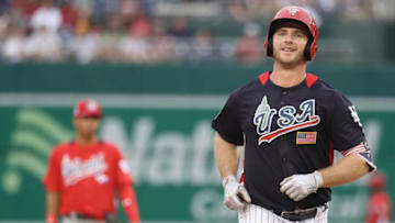 WASHINGTON, DC - JULY 15: Peter Alonso #20 of the New York Mets and the U.S. Team celebrates after scoring a two-run home run in the seventh inning against the World Team during the SiriusXM All-Star Futures Game at Nationals Park on July 15, 2018 in Washington, DC. (Photo by Rob Carr/Getty Images)