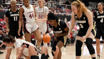 Feb 13, 2022; Stanford, California, USA; Colorado Buffaloes guards Jaylyn Sherrod (00) and Frida Formann (3) react after a charge call drawn by forward Peanut Tuitele (33) during the second quarter against the Stanford Cardinal at Maples Pavilion. Mandatory Credit: Darren Yamashita-USA TODAY Sports