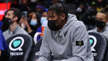ATLANTA, GEORGIA - JANUARY 15: Cam Reddish #21 of the New York Knicks looks on from the bench against the Atlanta Hawks during the first half at State Farm Arena on January 15, 2022 in Atlanta, Georgia. Reddish was just traded to the Knicks on January 13, 2022. NOTE TO USER: User expressly acknowledges and agrees that, by downloading and or using this photograph, User is consenting to the terms and conditions of the Getty Images License Agreement. (Photo by Kevin C. Cox/Getty Images)