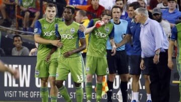 Jun 1, 2016; Washington, DC, USA; Seattle Sounders forward Jordan Morris (13) celebrates with Sounders defender Joevin Jones (33) after scoring a goal against D.C. United in the second half at Robert F. Kennedy Memorial Stadium. The Sounders won 2-0. Mandatory Credit: Geoff Burke-USA TODAY Sports