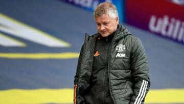 Manchester United's Norwegian manager Ole Gunnar Solskjaer leaves after the English Premier League football match between Leeds United and Manchester United at Elland Road in Leeds, northern England on April 25, 2021. - RESTRICTED TO EDITORIAL USE. No use with unauthorized audio, video, data, fixture lists, club/league logos or 'live' services. Online in-match use limited to 120 images. An additional 40 images may be used in extra time. No video emulation. Social media in-match use limited to 120 images. An additional 40 images may be used in extra time. No use in betting publications, games or single club/league/player publications. (Photo by PETER POWELL / POOL / AFP) / RESTRICTED TO EDITORIAL USE. No use with unauthorized audio, video, data, fixture lists, club/league logos or 'live' services. Online in-match use limited to 120 images. An additional 40 images may be used in extra time. No video emulation. Social media in-match use limited to 120 images. An additional 40 images may be used in extra time. No use in betting publications, games or single club/league/player publications. / RESTRICTED TO EDITORIAL USE. No use with unauthorized audio, video, data, fixture lists, club/league logos or 'live' services. Online in-match use limited to 120 images. An additional 40 images may be used in extra time. No video emulation. Social media in-match use limited to 120 images. An additional 40 images may be used in extra time. No use in betting publications, games or single club/league/player publications. (Photo by PETER POWELL/POOL/AFP via Getty Images)