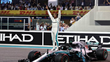 ABU DHABI, UNITED ARAB EMIRATES - NOVEMBER 25: Race winner Lewis Hamilton of Great Britain and Mercedes GP celebrates on track during the Abu Dhabi Formula One Grand Prix at Yas Marina Circuit on November 25, 2018 in Abu Dhabi, United Arab Emirates. (Photo by Lars Baron/Getty Images)
