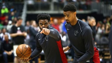 ATLANTA, GA - APRIL 4: Derrick Walton Jr. #14 of the Miami Heat and Jordan Mickey #25 of the Miami Heat warm up before the game against the Atlanta Hawks on April 4, 2018 at Philips Arena in Atlanta, Georgia. NOTE TO USER: User expressly acknowledges and agrees that, by downloading and/or using this Photograph, user is consenting to the terms and conditions of the Getty Images License Agreement. Mandatory Copyright Notice: Copyright 2018 NBAE (Photo by Kevin Liles/NBAE via Getty Images)
