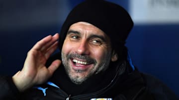 OXFORD, ENGLAND - DECEMBER 18: Pep Guardiola, Manager of Manchester City laughs prior to the Carabao Cup Quarter Final match between Oxford United and Manchester City at Kassam Stadium on December 18, 2019 in Oxford, England. (Photo by Justin Setterfield/Getty Images)