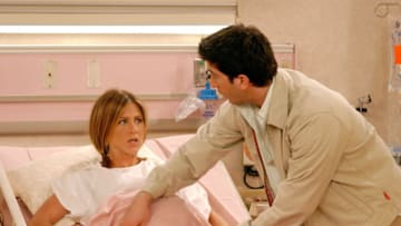 UNDATED PHOTO: Actors Jennifer Aniston (L) and David Schwimmer are shown in a scene from the NBC series "Friends". The series received 11 Emmy nominations, including outstanding comedy series, by the Academy of Television Arts and Sciences July 18, 2002 in Los Angeles, California. (Photo by Warner Bros. Television/Getty Images)