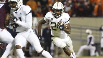 BLACKSBURG, VA - OCTOBER 25: Running back Jordan Mason #24 of the Georgia Tech Yellow Jackets rushes against the Virginia Tech Hokies in the first half at Lane Stadium on October 25, 2018 in Blacksburg, Virginia. (Photo by Michael Shroyer/Getty Images)