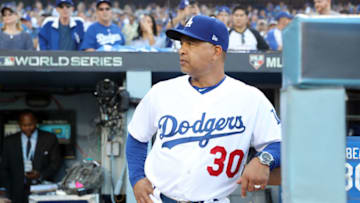 LOS ANGELES, CA - OCTOBER 26: Manager Dave Roberts #30 of the Los Angeles Dodgers looks on from the dugout prior to Game 3 of the 2018 World Series against the Boston Red Sox at Dodger Stadium on Friday, October 26, 2018 in Los Angeles, California. (Photo by Rob Tringali/MLB Photos via Getty Images)