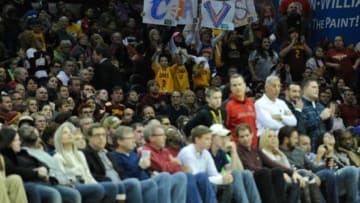 Nov 30, 2013; Cleveland, OH, USA; Fans hold up a sign during a game between the Cleveland Cavaliers and the Chicago Bulls at Quicken Loans Arena. Mandatory Credit: David Richard-USA TODAY Sports