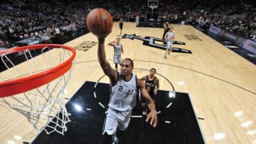 SAN ANTONIO, TX - JANUARY 5: Kawhi Leonard #2 of the San Antonio Spurs dunks the ball during game against the Phoenix Suns on January 5, 2018 at the AT&T Center in San Antonio, Texas. NOTE TO USER: User expressly acknowledges and agrees that, by downloading and or using this photograph, user is consenting to the terms and conditions of the Getty Images License Agreement. Mandatory Copyright Notice: Copyright 2018 NBAE (Photos by Mark Sobhani/NBAE via Getty Images)