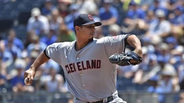 Jul 20, 2016; Kansas City, MO, USA; Cleveland Indians pitcher Carlos Carrasco (59) delivers a pitch against the Kansas City Royals during the first inning at Kauffman Stadium. Mandatory Credit: Peter G. Aiken-USA Today Sports