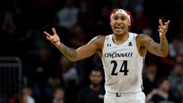 Cincinnati Bearcats guard Jeremiah Davenport celebrates during game against Tulane Green Wave at Fifth Third Arena. The Enquirer.