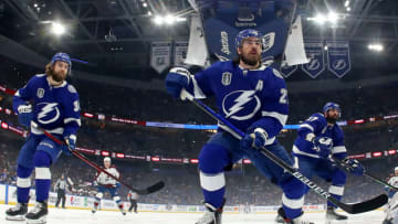 TAMPA, FLORIDA - JUNE 26: Brandon Hagel #38, Ryan McDonagh #27, and Alex Killorn #17 of the Tampa Bay Lightning look toward the goal in the first period of Game Six of the 2022 NHL Stanley Cup Final against the Colorado Avalanche at Amalie Arena on June 26, 2022 in Tampa, Florida. (Photo by Bruce Bennett/Getty Images)
