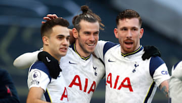 LONDON, ENGLAND - FEBRUARY 28: Gareth Bale (C) of Tottenham Hotspur celebrates with team mates (L - R) Sergio Reguilon and Pierre-Emile Hojbjerg after scoring their side's fourth goal during the Premier League match between Tottenham Hotspur and Burnley at Tottenham Hotspur Stadium on February 28, 2021 in London, England.. (Photo by Matthew Childs - Pool/Getty Images)