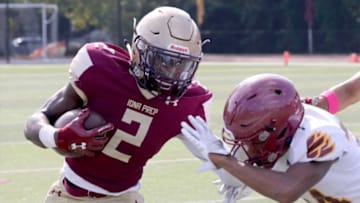 Iona Prep's Ellis Robinson IV carries the ball against Cardinal Hayes during their football game at Iona Prep in New Rochelle, Oct. 16, 2021.Iona Prep Vs Cardinal Hayes Football