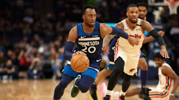 MINNEAPOLIS, MINNESOTA - JANUARY 09: Josh Okogie #20 of the Minnesota Timberwolves dribbles the ball against the Portland Trail Blazers. (Photo by Hannah Foslien/Getty Images)