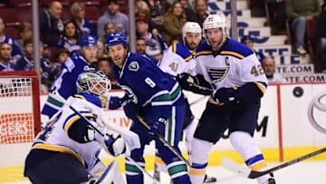 Oct 16, 2015; Vancouver, British Columbia, CAN; St. Louis Blues goaltender Jake Allen (34) stops a shot on net by the Vancouver Canucks during the first period at Rogers Arena. Mandatory Credit: Anne-Marie Sorvin-USA TODAY Sports