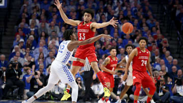 LEXINGTON, KENTUCKY - DECEMBER 28: Jordan Nwora #33 of the Louisville Cardinals defends Keion Brooks Jr #12 of the Kentucky Wildcats at Rupp Arena on December 28, 2019 in Lexington, Kentucky. (Photo by Andy Lyons/Getty Images)