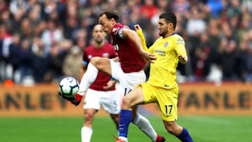 LONDON, ENGLAND - SEPTEMBER 23: Mark Noble of West Ham United controls the ball under pressure from Mateo Kovacic of Chelsea during the Premier League match between West Ham United and Chelsea FC at London Stadium on September 23, 2018 in London, United Kingdom. (Photo by Dan Istitene/Getty Images)