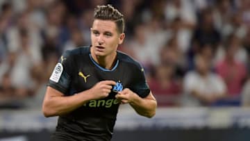 Marseille's French forward Florian Thauvin celebrates after scoring a goal during the French L1 football match between Lyon (OL) and Marseille (OM) on September 23, 2018 at the Groupama stadium in Décines-Charpieu near Lyon. (Photo by ROMAIN LAFABREGUE / AFP) (Photo credit should read ROMAIN LAFABREGUE/AFP/Getty Images)