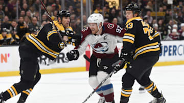 BOSTON, MA - FEBRUARY 10: Gabriel Landeskog #92 of the Colorado Avalanche skates against Zdeno Chara #33 and Charlie McAvoy #73 of the Boston Bruins at the TD Garden on February 10, 2019 in Boston, Massachusetts. (Photo by Steve Babineau/NHLI via Getty Images)