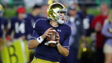 SOUTH BEND, IN - SEPTEMBER 29: Notre Dame Fighting Irish quarterback Ian Book (12) looks to throw the football in action during a college football game between the Stanford Cardinal and the Notre Dame Fighting Irish on September 29, 2018 at Notre Dame Stadium in South Bend, IN. (Photo by Robin Alam/Icon Sportswire via Getty Images)