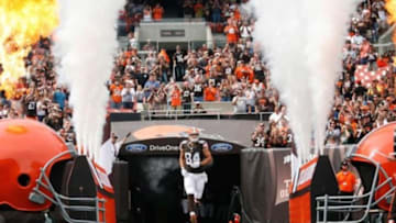 Sep 29, 2013; Cleveland, OH, USA; Cleveland Browns tight end Jordan Cameron (84) runs onto the field before the game against the Cincinnati Bengals at FirstEnergy Stadium. Mandatory Credit: Raj Mehta-USA TODAY Sports