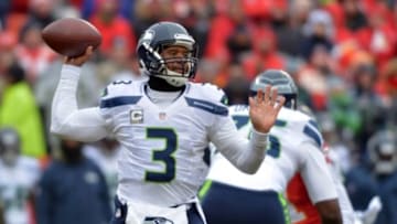 Nov 16, 2014; Kansas City, MO, USA; Seattle Seahawks quarterback Russell Wilson (3) throws a pass during the first half against the Kansas City Chiefs at Arrowhead Stadium. Mandatory Credit: Denny Medley-USA TODAY Sports