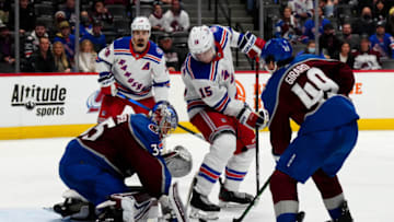 Dec 14, 2021; Denver, Colorado, USA; New York Rangers right wing Julien Gauthier (15) attempts to score past goaltender Darcy Kuemper (35) and Colorado Avalanche defenseman Samuel Girard (49) in the third period at Ball Arena. Mandatory Credit: Ron Chenoy-USA TODAY Sports