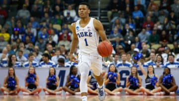 PITTSBURGH, PA - MARCH 15: Trevon Duval #1 of the Duke Blue Devils keeps possession of the ball aganst the Iona Gaels during the first half of the game in the first round of the 2018 NCAA Men's Basketball Tournament at PPG PAINTS Arena on March 15, 2018 in Pittsburgh, Pennsylvania. (Photo by Justin K. Aller/Getty Images)