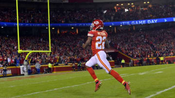 KANSAS CITY, MO - OCTOBER 30: Kansas City Chiefs cornerback Marcus Peters (22) head to the end zone for a core after picking up fumble after stripping the ball from Denver Broncos running back Jamaal Charles (28) during the first quarter on October 30, 2017 in Kansas City, MO at Arrowhead Stadium. (Photo by John Leyba/The Denver Post via Getty Images)