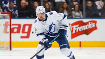 TORONTO, ON - APRIL 4: Anton Stralman #6 of the Tampa Bay Lightning plays the puck against the Toronto Maple Leafs during the second period at the Scotiabank Arena on April 4, 2019 in Toronto, Ontario, Canada. (Photo by Mark Blinch/NHLI via Getty Images)