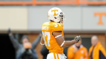 Nov 15, 2014; Knoxville, TN, USA; Tennessee Volunteers defensive back Brian Randolph (37) returns an interception for a touchdown against the Kentucky Wildcats during the first half at Neyland Stadium. Mandatory Credit: Randy Sartin-USA TODAY Sports
