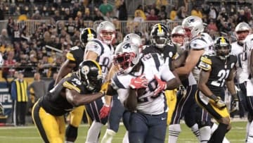 Oct 23, 2016; Pittsburgh, PA, USA; New England Patriots running back LeGarrette Blount (29) runs for a touchdown past Pittsburgh Steelers linebacker Vince Williams (98) during the fourth quarter at Heinz Field. New England won 27-16.Mandatory Credit: Charles LeClaire-USA TODAY Sports