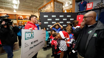 Kansas City Chiefs quarterback Patrick Mahomes II takes part in a check donation and shopping spree event to benefit players with KC United, a local youth football league at the DICKS Sporting Goods, Tuesday, Nov. 27, 2018 in Leawood, Kan. (Colin Braley/AP Images for DICK'S Sporting Goods)