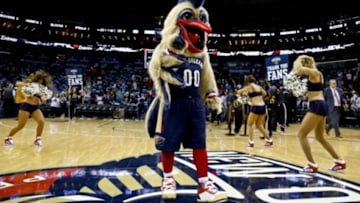 Nov 16, 2013; New Orleans, LA, USA; New Orleans Pelicans mascot Pierre the Pelican celebrates a win over the Philadelphia 76ers following a game at New Orleans Arena. The Pelicans defeated the 76ers 135-98. Mandatory Credit: Derick E. Hingle-USA TODAY Sports