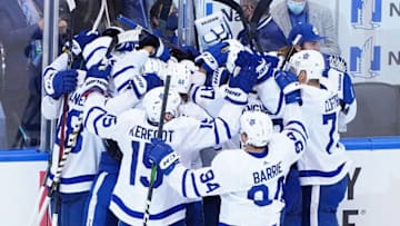 Auston Matthews #34 of the Toronto Maple Leafs celebrates his game winning goal at 13:10 in overtime to defeat the Columbus Blue Jackets. (Photo by Andre Ringuette/Freestyle Photo/Getty Images)